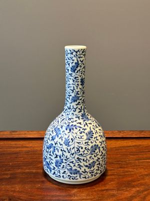 A Chinese blue and white 'lotus scroll' bottle vase, Yongzheng mark and possibly of the period — 照片 1