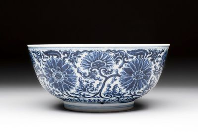A Chinese blue and white 'lotus scroll' bowl, Xuande mark, Kangxi