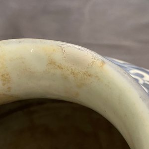 A Chinese blue and white 'lotus scroll' vase, 19/20th C. — photo 13