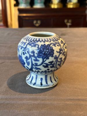 A Chinese blue and white 'lotus scroll' vase, Ming — photo 1