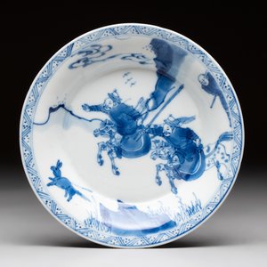 A Chinese blue and white 'Mongolian hunting' cup and saucer, jade mark, Kangxi — photo 2