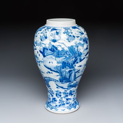 A Chinese blue and white moulded vase with landscape and flower panels, Kangxi