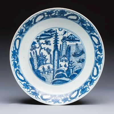 A Chinese blue and white 'Mountainous Landscape' dish, Jiajing