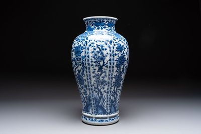 A Chinese blue and white octagonal vase with birds among flowering branches, Kangxi