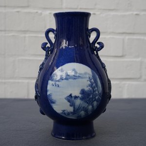 A Chinese blue and white on powder blue ground hu vase, Qianlong mark, 19/20th C. — photo 9