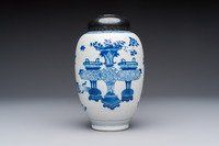 A Chinese blue and white ovoid 'Antiquities' jar with a wooden cover, Kangxi