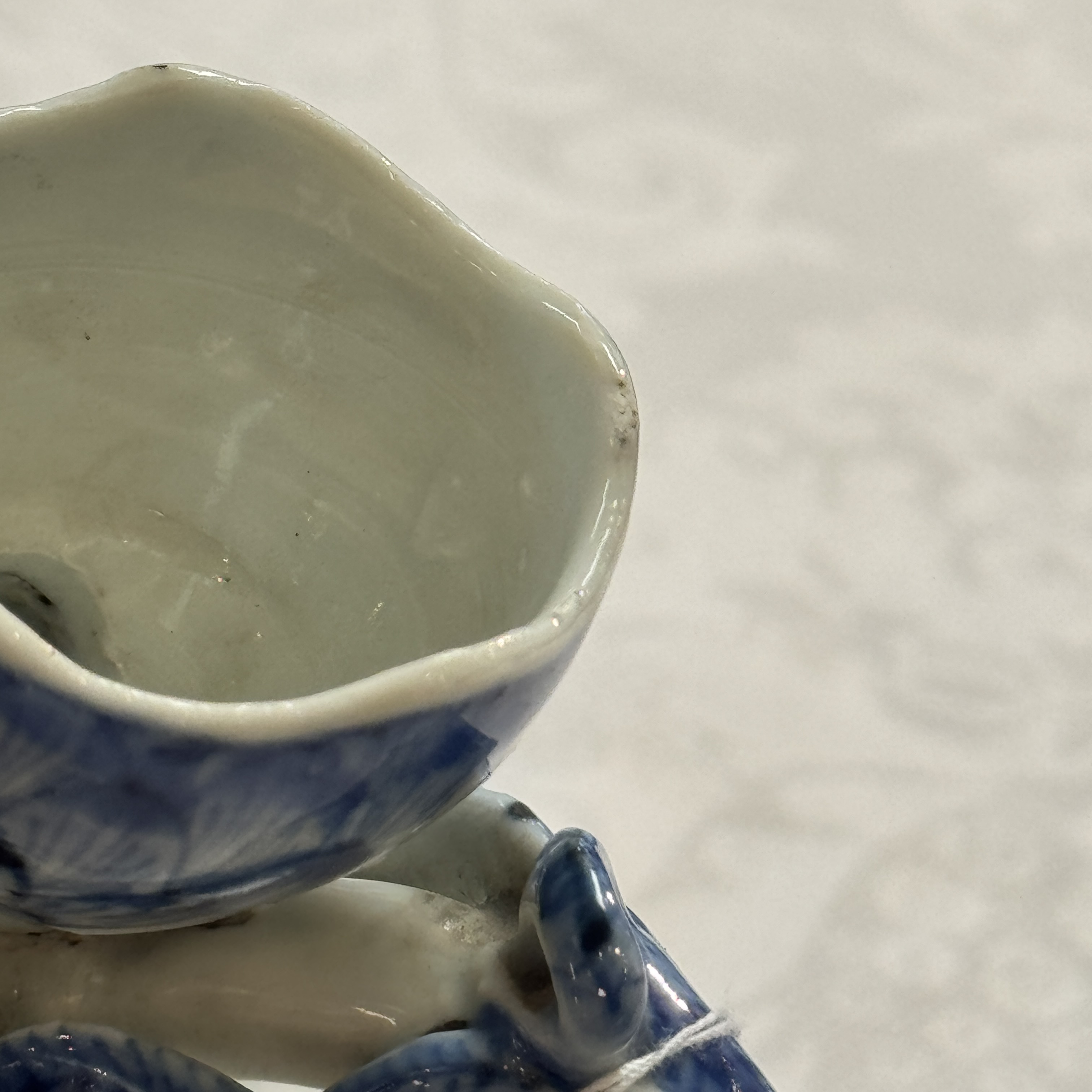 A Chinese blue and white peach-shaped cadogan-type wine pot  — photo 22
