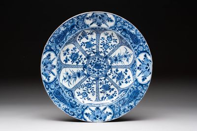 A Chinese blue and white 'peacock border' dish, Kangxi