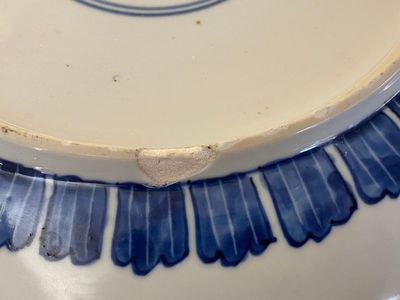 A Chinese blue and white 'peony scroll' dish and a famille verte dish, Kangxi — photo 16