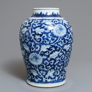 A Chinese blue and white 'peony scroll' vase, Kangxi — photo 1