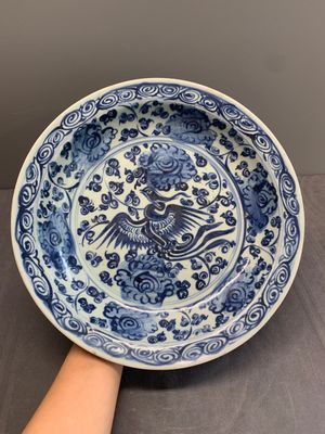 A Chinese blue and white 'phoenix and peonies' dish, Hongzhi/Zhengde — photo 1