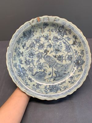 A Chinese blue and white 'phoenix' dish and two 'Buddhist lion' and 'peony' plates, Hongzhi/Zhengde — photo 1