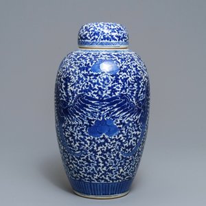 A Chinese blue and white 'phoenix' jar and cover, 19th C. — photo 1