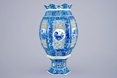 A Chinese blue and white pierced lantern on stand, 19th C.