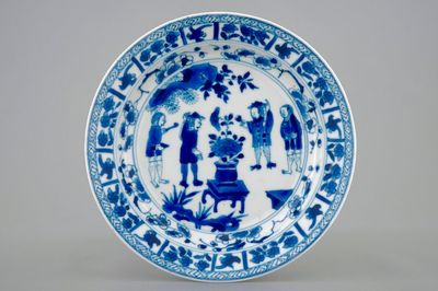A Chinese blue and white plate depicting the sense of smell, Kangxi