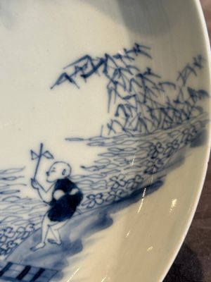 A Chinese blue and white plate with a breastfeeding woman and fishermen on boats, Yongzheng — photo 2