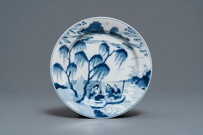 A Chinese blue and white plate with fishermen and boats, Chenghua mark, Kangxi