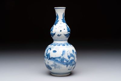 A Chinese blue and white 'playing boys' double gourd vase, Transitional period
