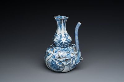 A Chinese blue and white 'pomegranate' kendi with gilt highlights, Wanli
