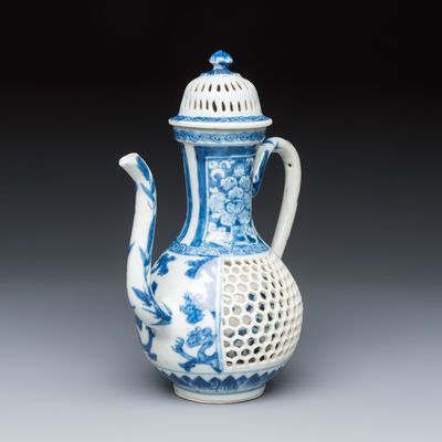 A Chinese blue and white reticulated 'Linglong' ewer and cover, Kangxi