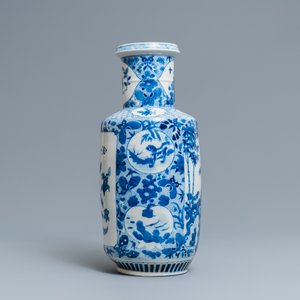 A Chinese blue and white rouleau vase with antiquities and floral designs, 19th C. — 照片 4