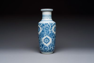 A Chinese blue and white rouleau vase with floral design, Kangxi
