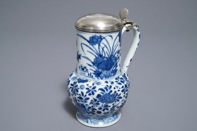 A Chinese blue and white silver-mounted floral jug, Kangxi