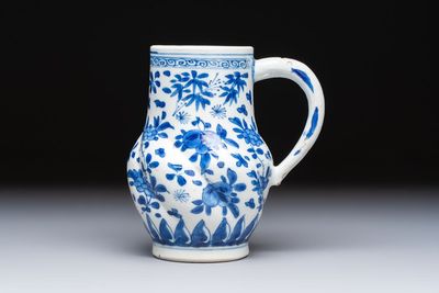 A Chinese blue and white twisted jug with floral design, Kangxi