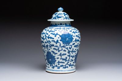 A Chinese blue and white vase and cover with floral design, Kangxi