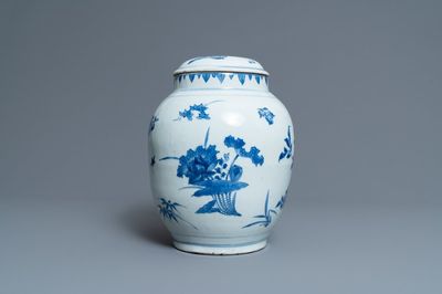 A Chinese blue and white vase and cover with floral sprigs, Transitional period
