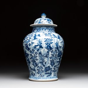 A Chinese blue and white vase and cover with landscapes and flowers, Kangxi — photo 1