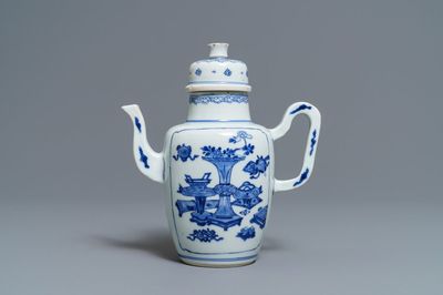 A Chinese blue and white wine jug and cover with antiquities, Kangxi