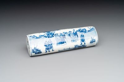 A Chinese blue and white wrist rest with figural design, 19th C.