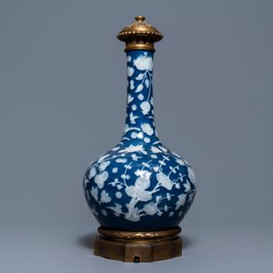 A Chinese blue-ground slip-decorated bottle vase with ormolu mounts, 19th C. — photo 4
