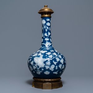 A Chinese blue-ground slip-decorated bottle vase with ormolu mounts, 19th C. — photo 5