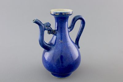 A Chinese blue poudre gold-painted jug, Kangxi, ca. 1700