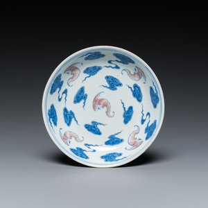 A Chinese blue, white and copper-red 'Bats and clouds' plate, Qianlong mark but probably later — photo 1