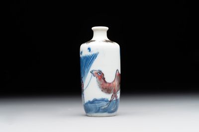 A Chinese blue, white and copper-red 'camel' snuff bottle, dragon mark, 19th C.