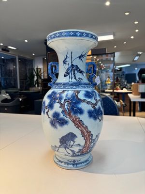 A Chinese blue, white and copper-red 'deer and pine tree' vase, Qianlong — photo 1