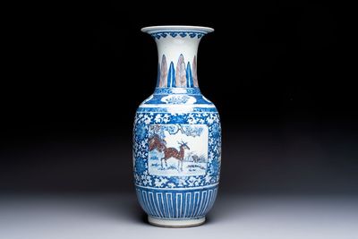 A Chinese blue, white and copper-red 'Deer' vase, 19th C.