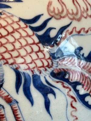 A Chinese blue, white and copper-red 'dragon and phoenix' vase, 19th C. — photo 18