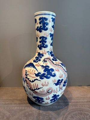 A Chinese blue, white and copper-red 'dragon and phoenix' vase, 19th C. — photo 2
