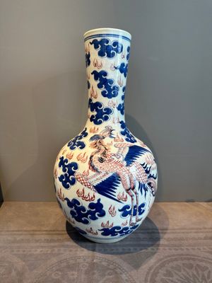A Chinese blue, white and copper-red 'dragon and phoenix' vase, 19th C. — photo 3