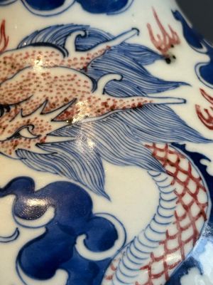 A Chinese blue, white and copper-red 'dragon and phoenix' vase, 19th C. — photo 8