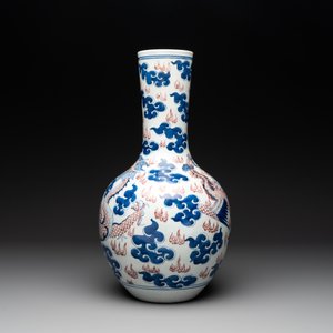 A Chinese blue, white and copper-red 'dragon and phoenix' vase, 19th C. — photo 2