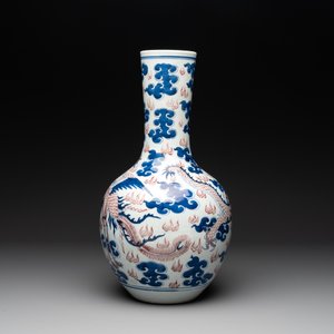 A Chinese blue, white and copper-red 'dragon and phoenix' vase, 19th C. — photo 4
