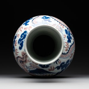 A Chinese blue, white and copper-red 'dragon and phoenix' vase, 19th C. — photo 5