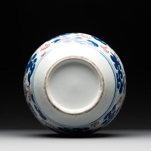 A Chinese blue, white and copper-red 'dragon and phoenix' vase, 19th C. — photo 6