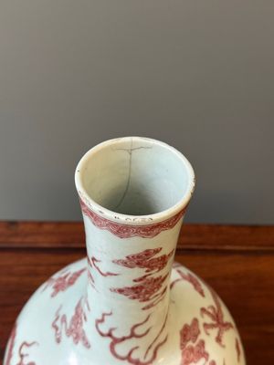 A Chinese blue, white and copper-red 'dragon' tianqiu ping' vase, 18th C. — photo 3
