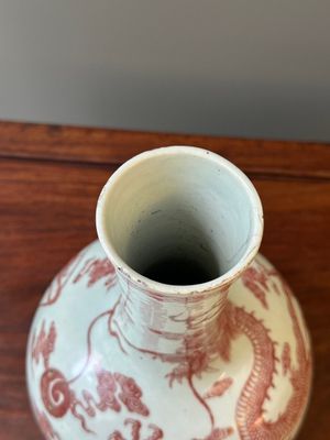 A Chinese blue, white and copper-red 'dragon' tianqiu ping' vase, 18th C. — photo 4